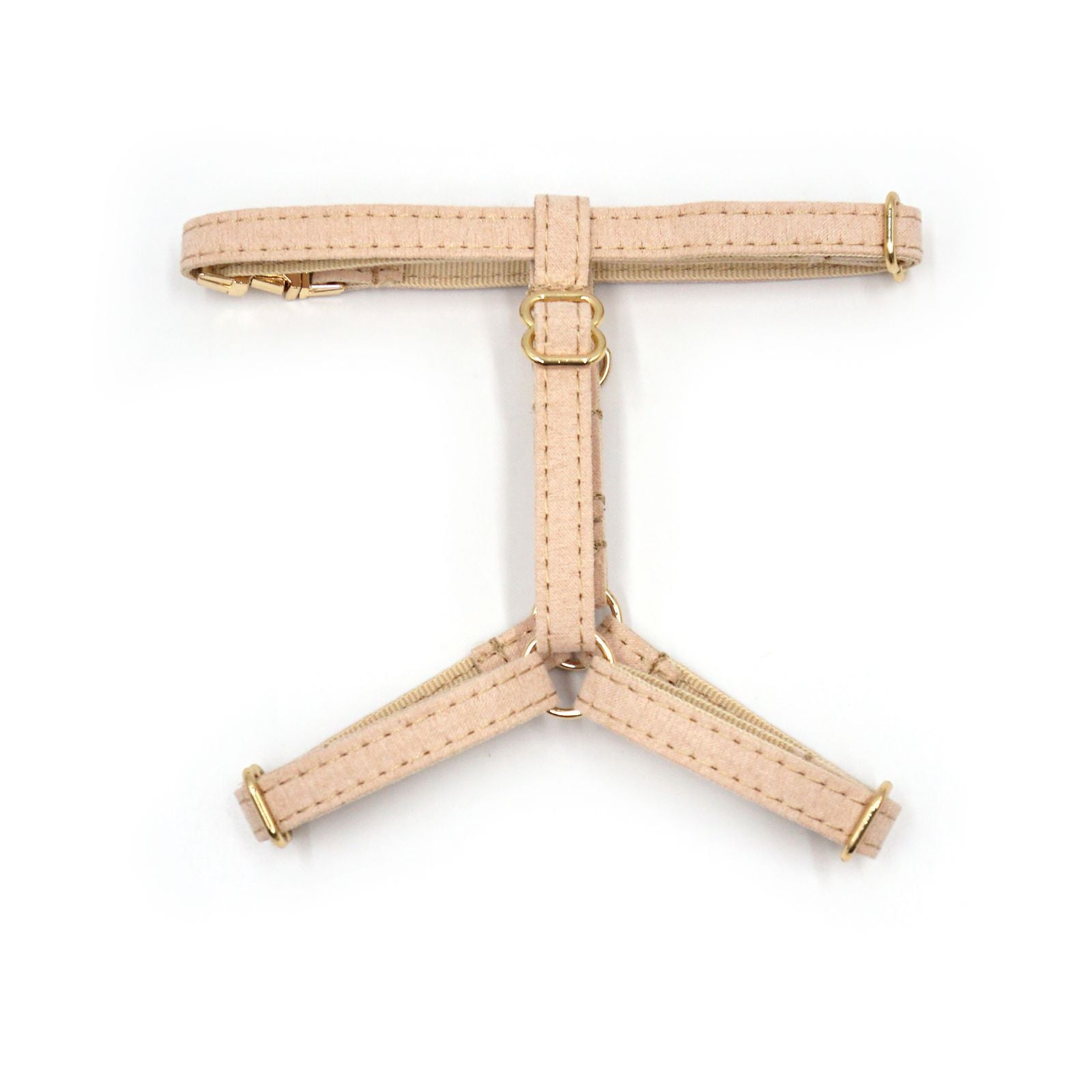 Harnais chat personnalisable en coton beige avec boucles dorées, design en forme triangulaire et zips visibles.
