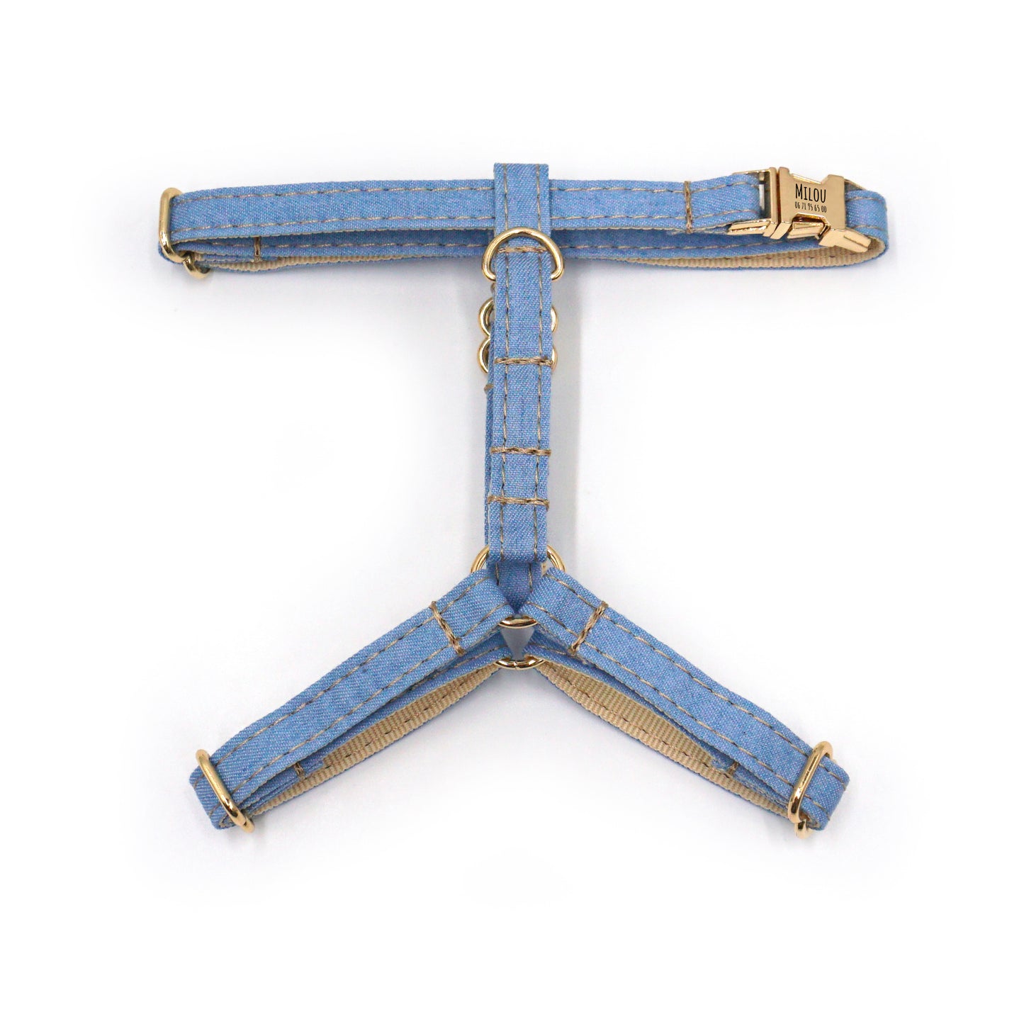 Harnais chat personnalisable en coton jean bleu avec raccords dorés et boucles, modèle ajustable pour sécurité.